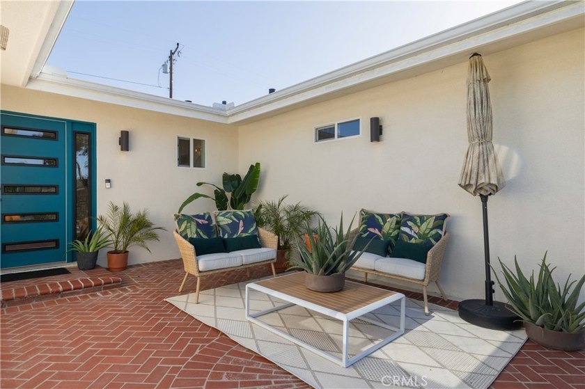 Welcome to Pageantry Haus, an impeccably updated four-bedroom - photo 3