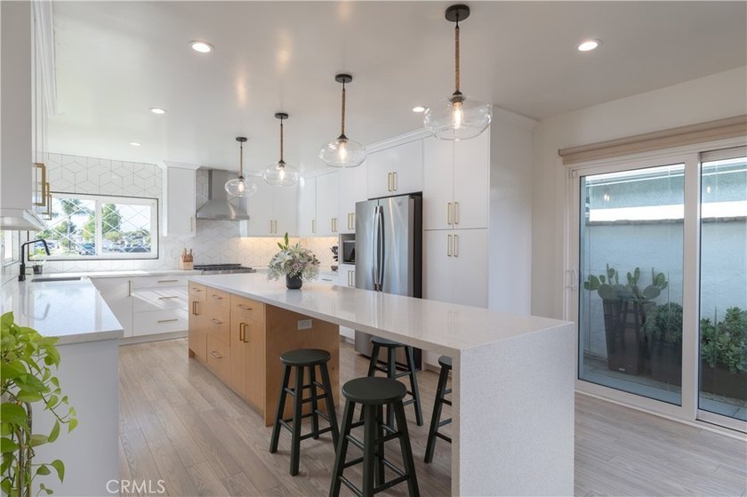 Welcome to Pageantry Haus, an impeccably updated four-bedroom - photo 7