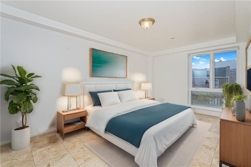 Welcome to this luxury three-bedroom, two bath duplex - photo 19