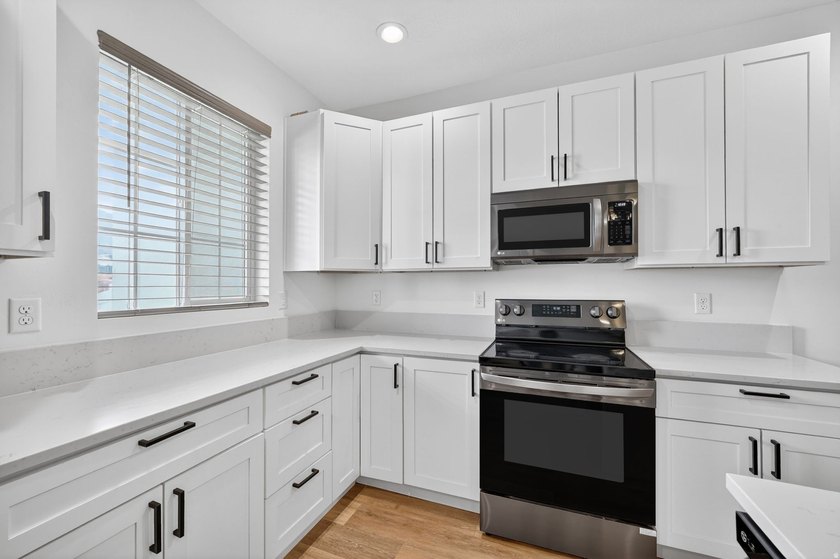 Come enjoy this like-new twin home. Located conveniently near - photo 13