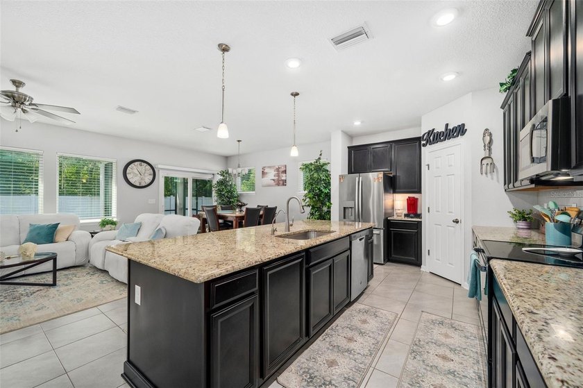 This stunning 2020 David Weekley home perfectly blends modern - photo 14