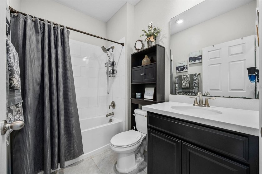 This stunning 2020 David Weekley home perfectly blends modern - photo 29