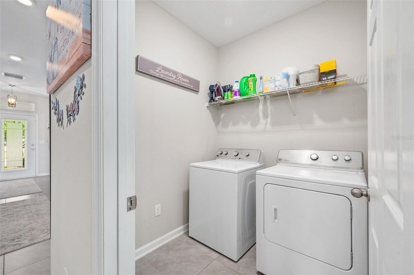 This stunning 2020 David Weekley home perfectly blends modern - photo 31