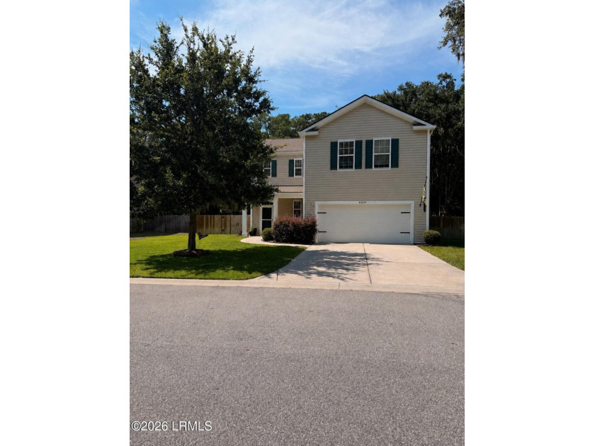 Welcome home to this meticulously maintained residence on - photo 2