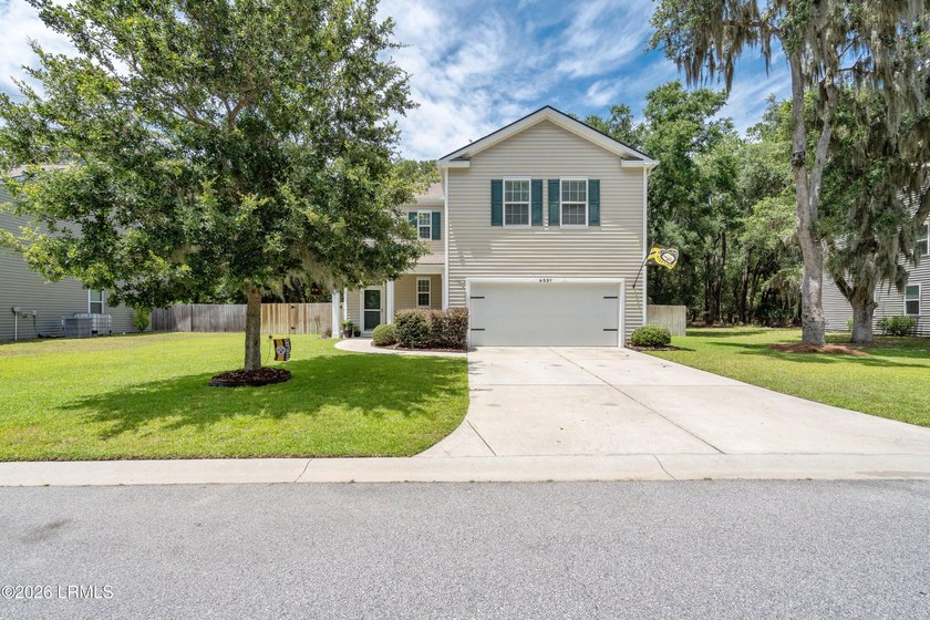 Welcome home to this meticulously maintained residence on - photo 4