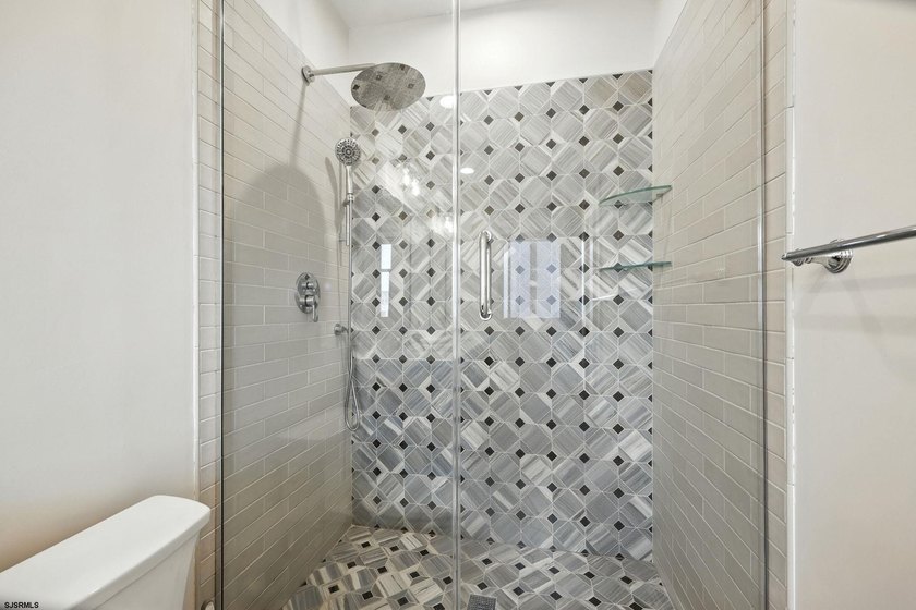 Stunning first-floor beachfront condo ideally positioned on a - photo 29