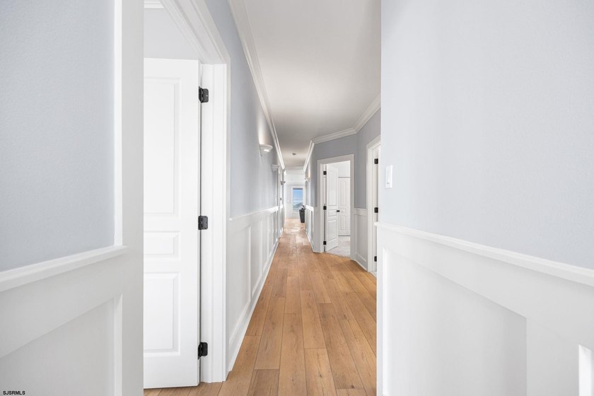 Stunning first-floor beachfront condo ideally positioned on a - photo 30