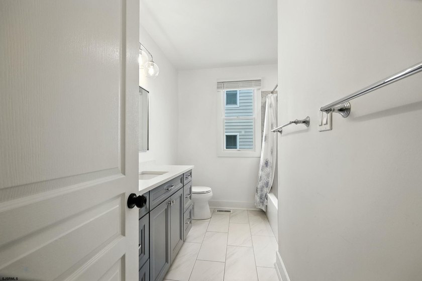 Stunning first-floor beachfront condo ideally positioned on a - photo 36
