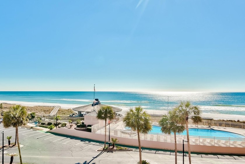 Jetty East is a Gulf front Gated 6-story midrise with under - photo 2