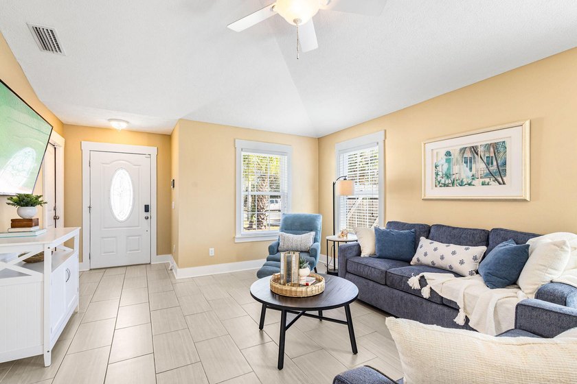 This well-located 3-bedroom, 2-bathroom home on the highly - photo 10
