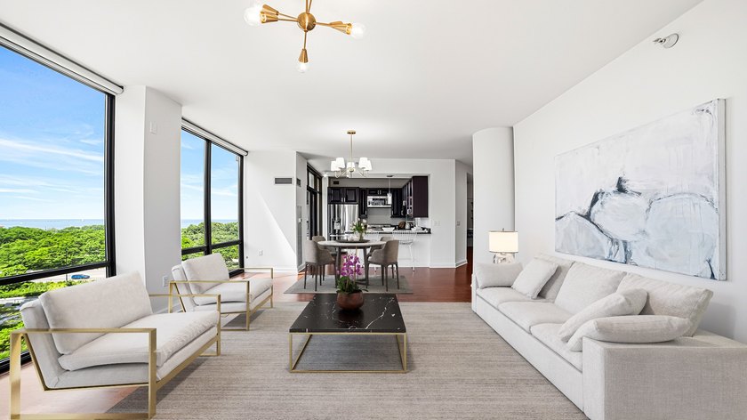 Sun-filled split two-bedroom, two-bath corner residence on the - photo 3