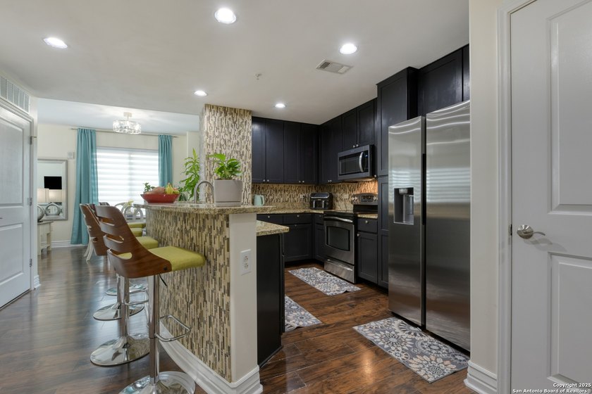 Luxury Condominium Offering Easy, Elegant Living! Welcome to - photo 5