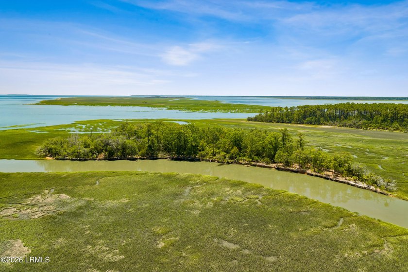 Discover an extraordinary 8-acre private island paradise, where - photo 7