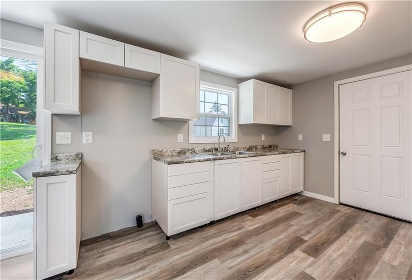 Completely remodeled and move-in ready, this 3-bedroom, 1-bath - photo 28