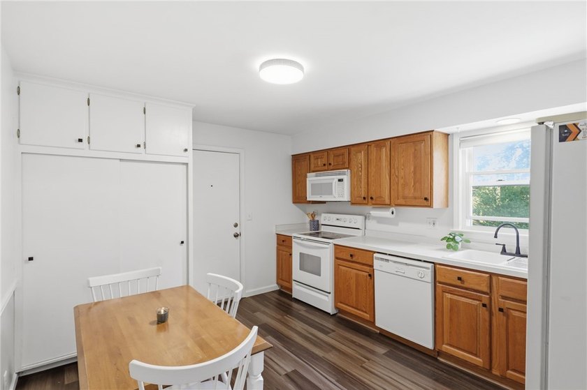 Welcome to this charming 4-bedroom 1.5 bath just yards away from - photo 8