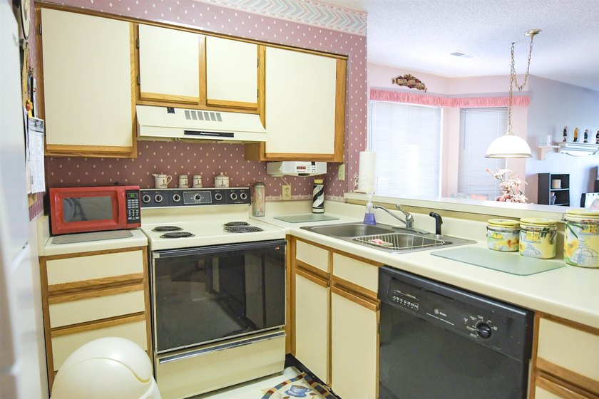 1st Floor End unit comes completely furnished including washer - photo 15