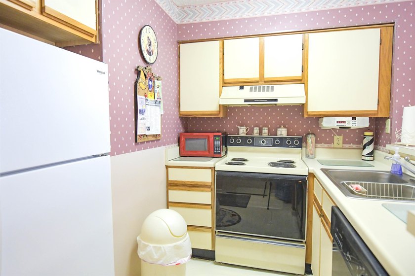 1st Floor End unit comes completely furnished including washer - photo 16
