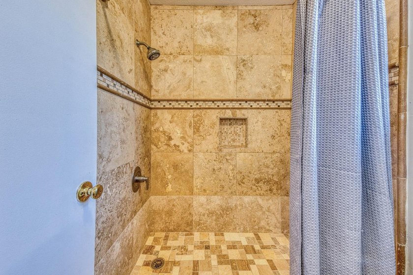The backyard alone will sell this house. A custom covered - photo 31