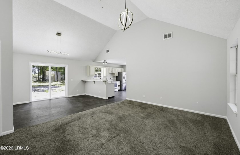 Welcome to 3 Eagle Trace, a charming 3-bedroom, 2-bath home on - photo 4