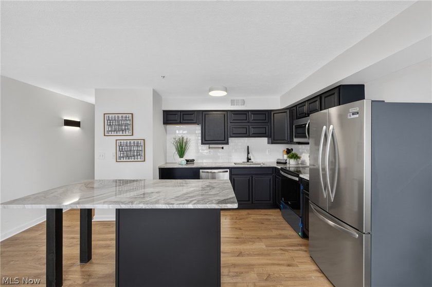 Welcome to urban living at its finest in the highly desirable - photo 11