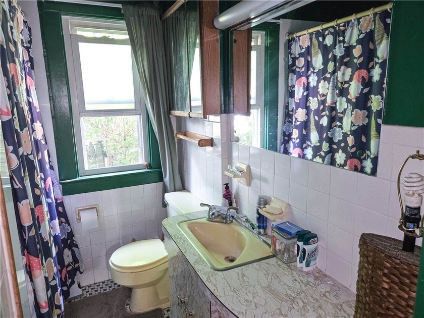 Opportunity awaits in this 4-bedroom Cape Cod located in - photo 8