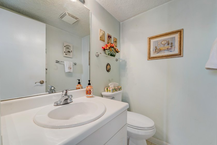 BEAUTIFUL LAKE VIEWS | 1st FLOOR UNIT | 2-bedrooms/1.5-baths - photo 12