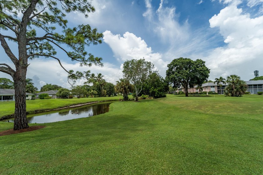 BEAUTIFUL LAKE VIEWS | 1st FLOOR UNIT | 2-bedrooms/1.5-baths - photo 16