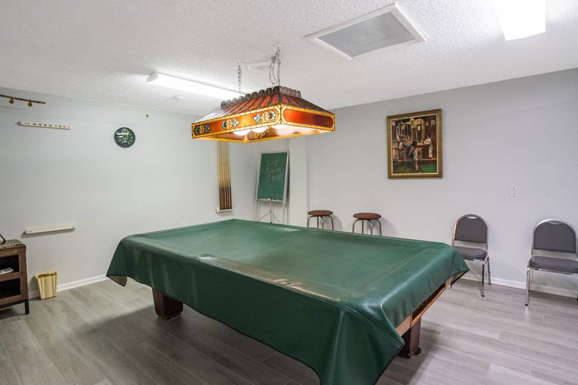 BEAUTIFUL LAKE VIEWS | 1st FLOOR UNIT | 2-bedrooms/1.5-baths - photo 22