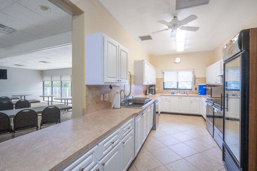 BEAUTIFUL LAKE VIEWS | 1st FLOOR UNIT | 2-bedrooms/1.5-baths - photo 25