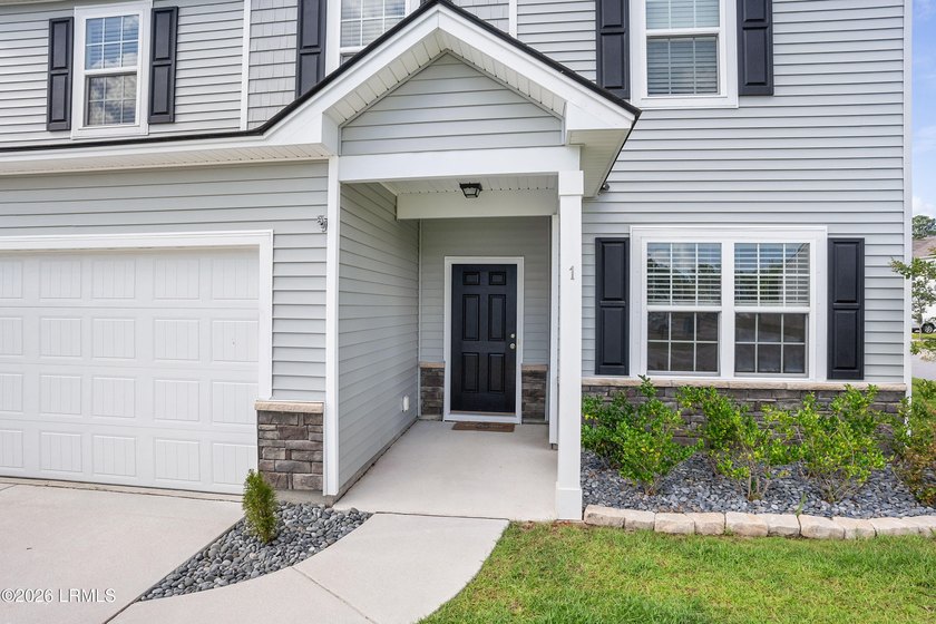 Welcome to 1 Toxaway Lane, where modern comfort meets Lowcountry - photo 3
