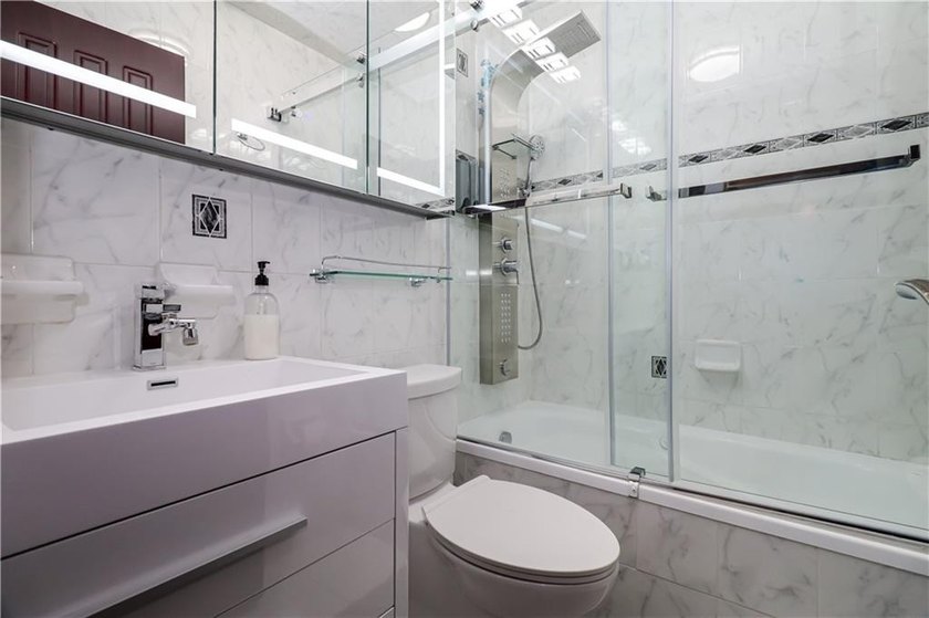 Unique 3-Bedroom Duplex in Sheepshead Bay Discover this - photo 9
