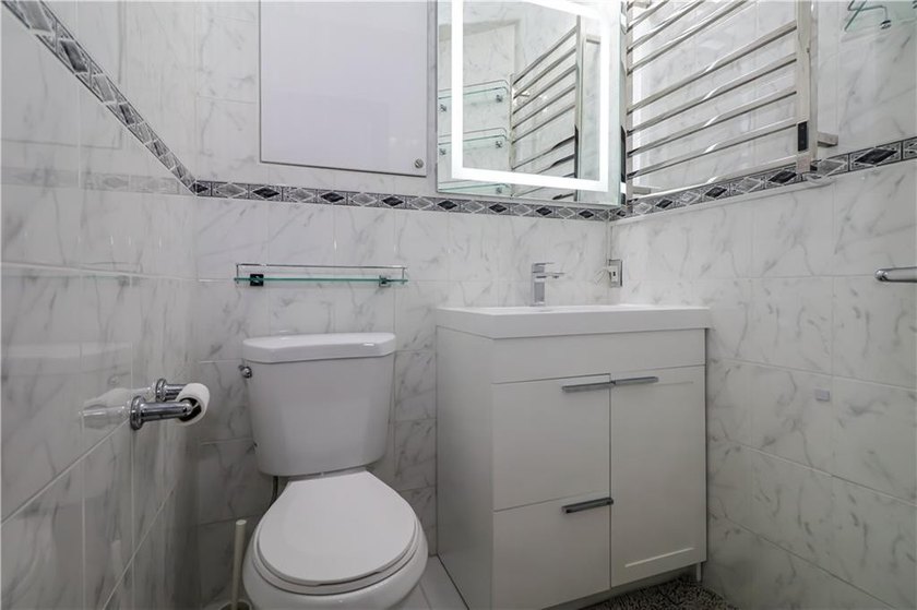 Unique 3-Bedroom Duplex in Sheepshead Bay Discover this - photo 10