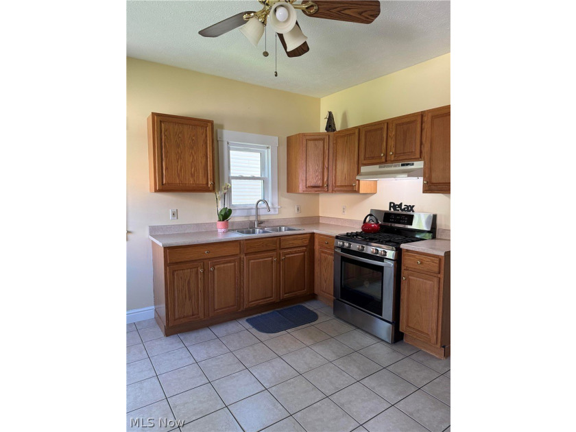 Welcome to 1369 Park Row, a bright and inviting home featuring - photo 15