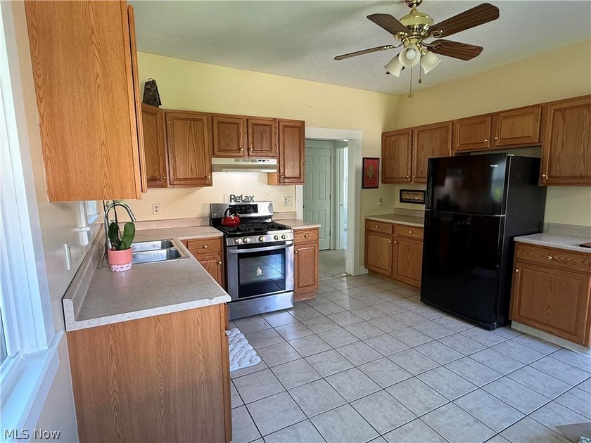 Welcome to 1369 Park Row, a bright and inviting home featuring - photo 16