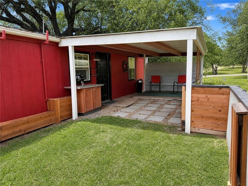 Discover this charming home with a detached guest house in - photo 12