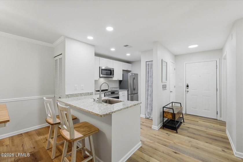 Beautifully updated with thoughtful renovations , this move-in - photo 4