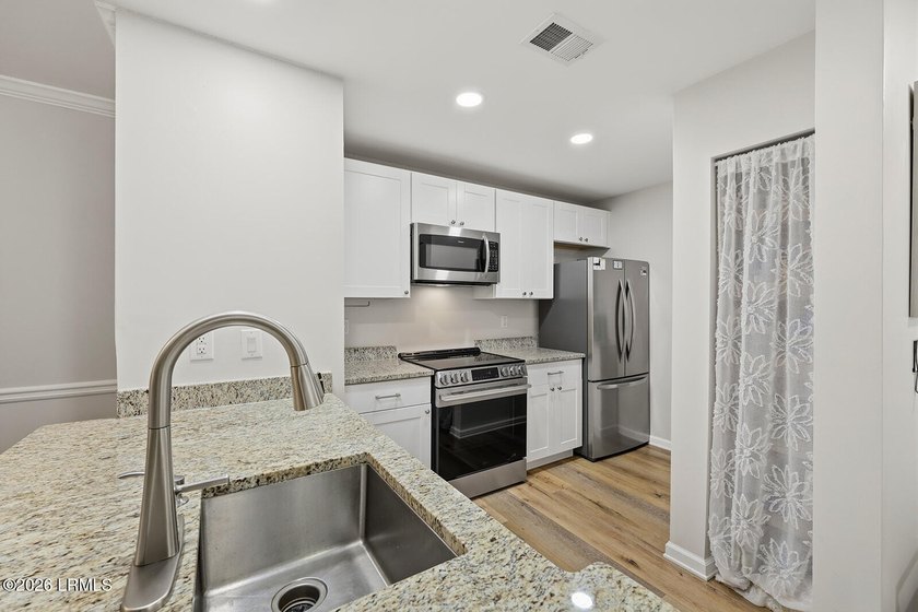 Beautifully updated with thoughtful renovations , this move-in - photo 9