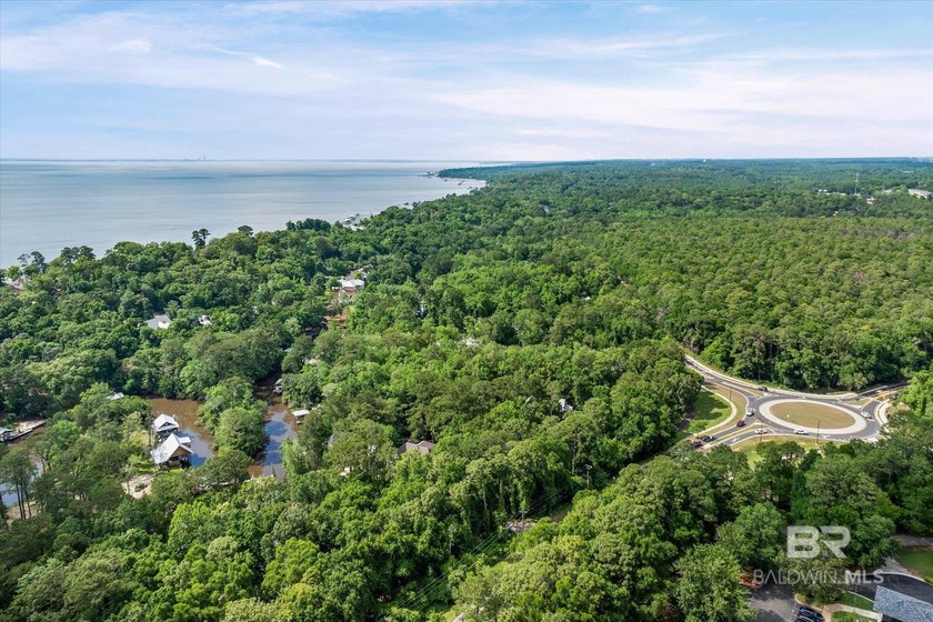 WATERFRONT - Build your dream home on this nearly 1.34 of an - photo 3