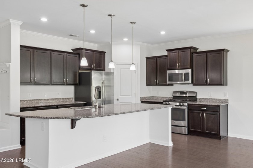 Welcome home to this beautiful 4-bedroom, 2.5-bath home in the - photo 6