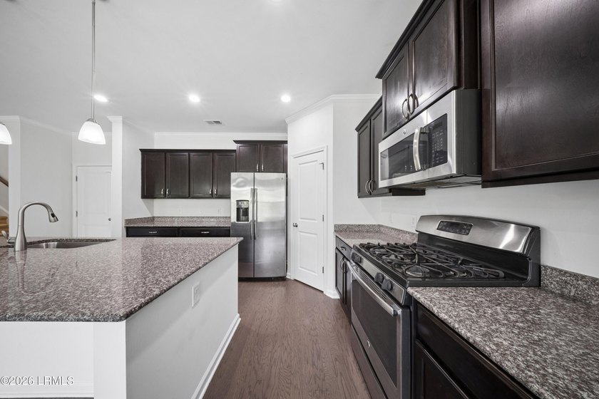 Welcome home to this beautiful 4-bedroom, 2.5-bath home in the - photo 7