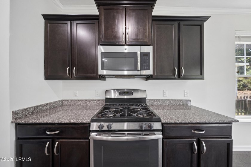 Welcome home to this beautiful 4-bedroom, 2.5-bath home in the - photo 8