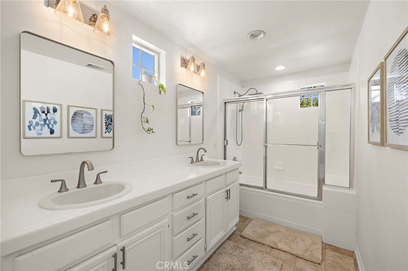 Bright, welcoming and impressively updated inside and out, this - photo 27