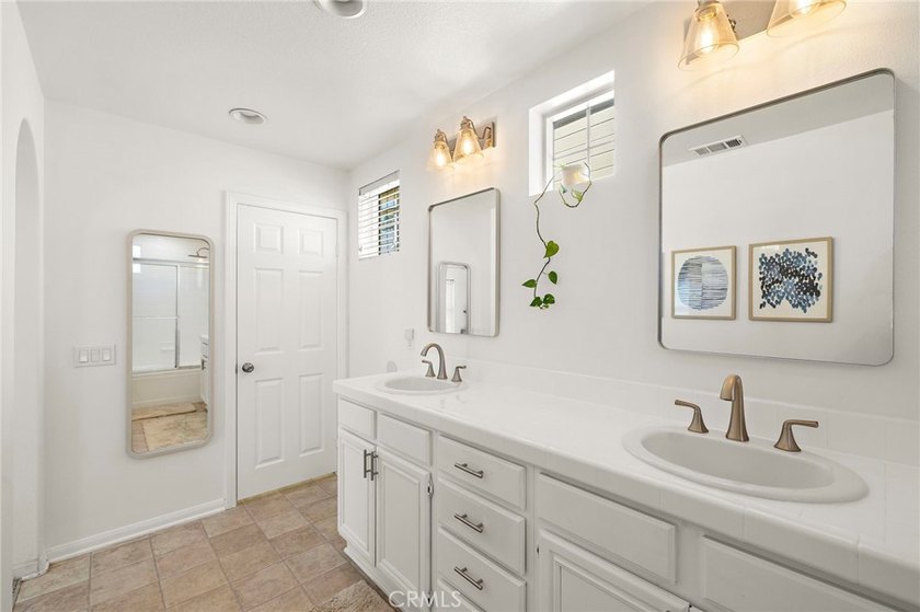 Bright, welcoming and impressively updated inside and out, this - photo 28