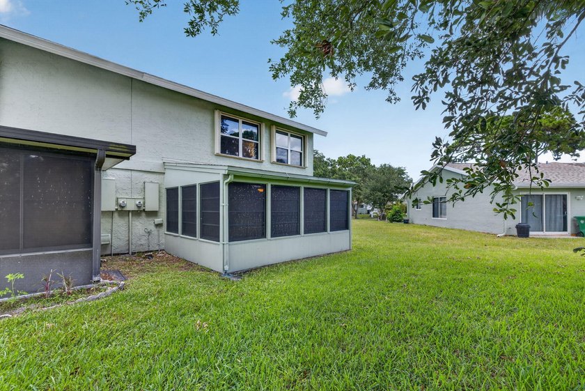 Welcome to this charming two-story townhouse located in - photo 32