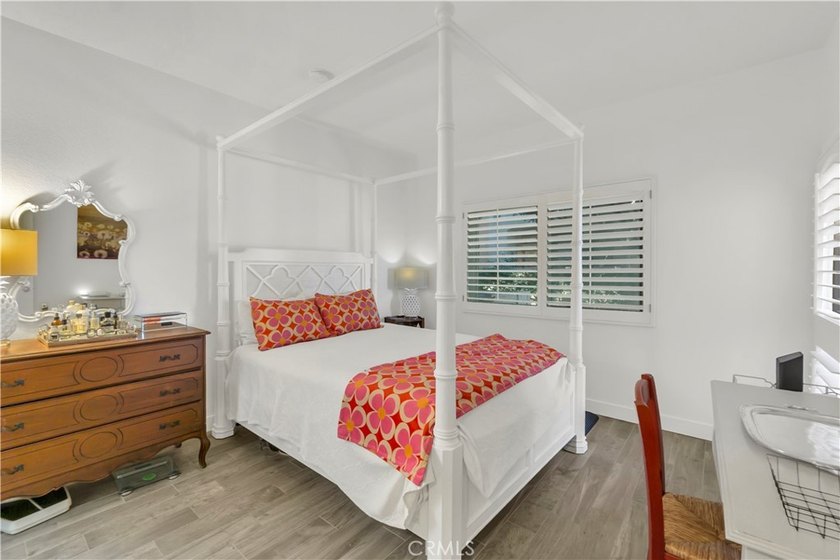 Tucked inside the gated Villa Point community, this lower-level - photo 11