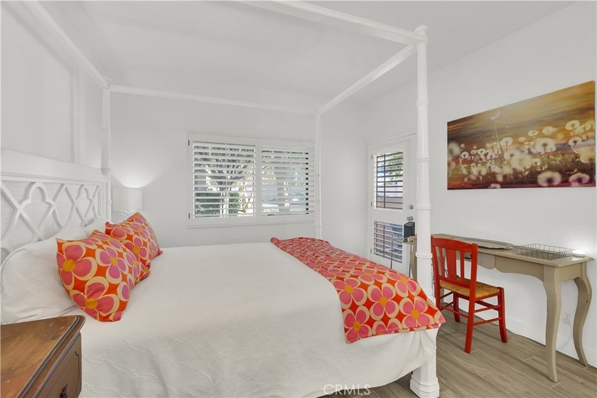 Tucked inside the gated Villa Point community, this lower-level - photo 12