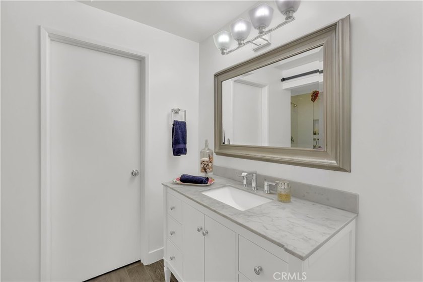 Tucked inside the gated Villa Point community, this lower-level - photo 15