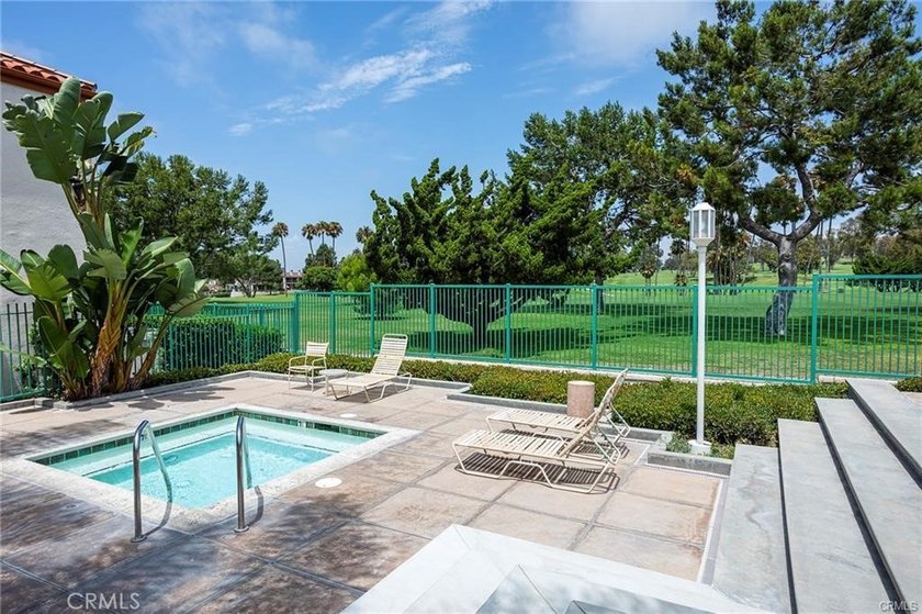 Tucked inside the gated Villa Point community, this lower-level - photo 19
