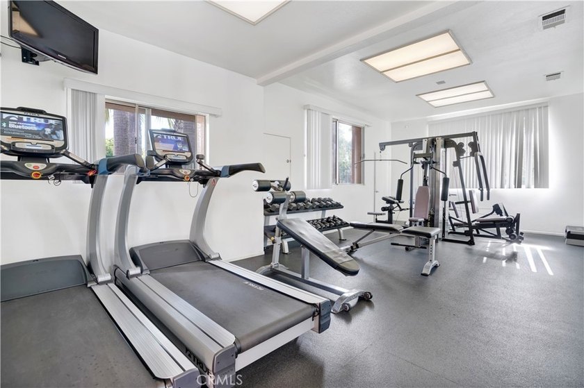 Tucked inside the gated Villa Point community, this lower-level - photo 21