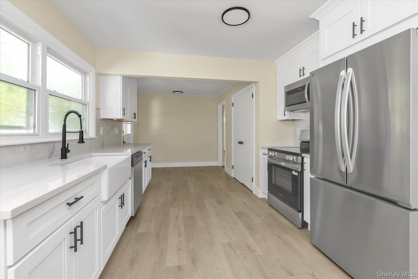 Welcome to this beautifully updated 4-bedroom, 2-bath home - photo 7